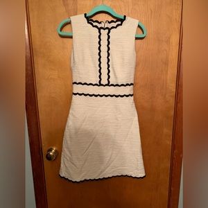 KATE SPADE. White tweed scallop dress with black detail.